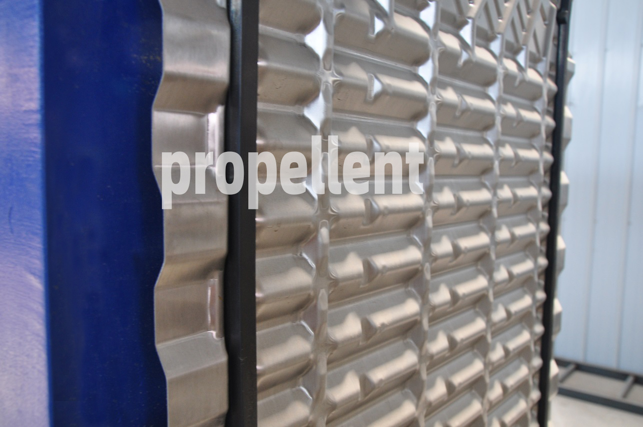 Viscosity molasses heating and cooling wide gap plate exchanger